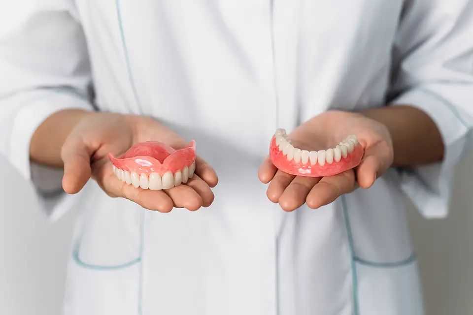 Dentures vs. Dental Implants: Choosing the Right Option for Your Smile at ORIS Dental Clinics 5 Dentures vs. Dental Implants: Choosing the Right Option for Your Smile at ORIS Dental Clinics